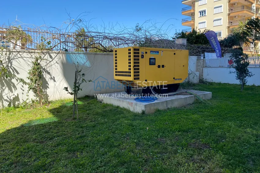 Three-room apartment in Mahmutlar with a view of the sea and mountains 13 