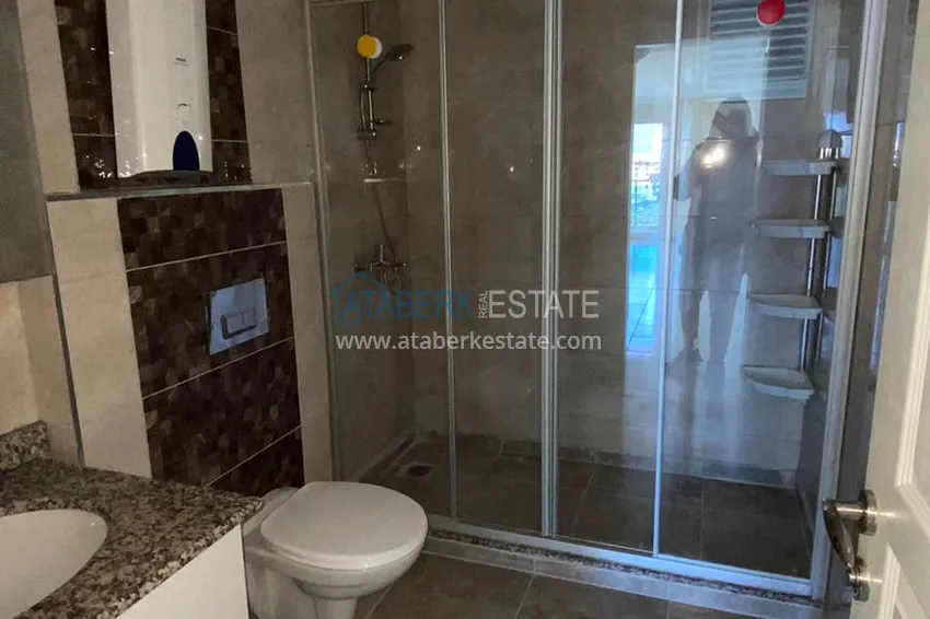 Purchase Three-room apartment in Mahmutlar with a view of the sea and mountains 14 