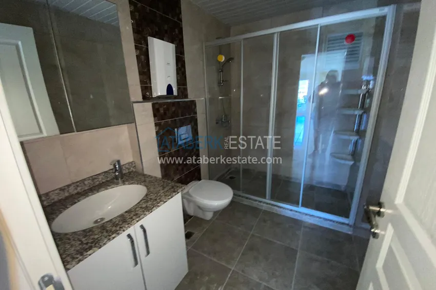 Purchase Three-room apartment in Mahmutlar with a view of the sea and mountains 16 