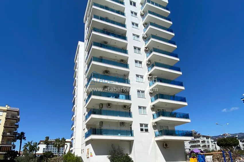 Three-room apartment in Mahmutlar with a view of the sea and mountains 1 