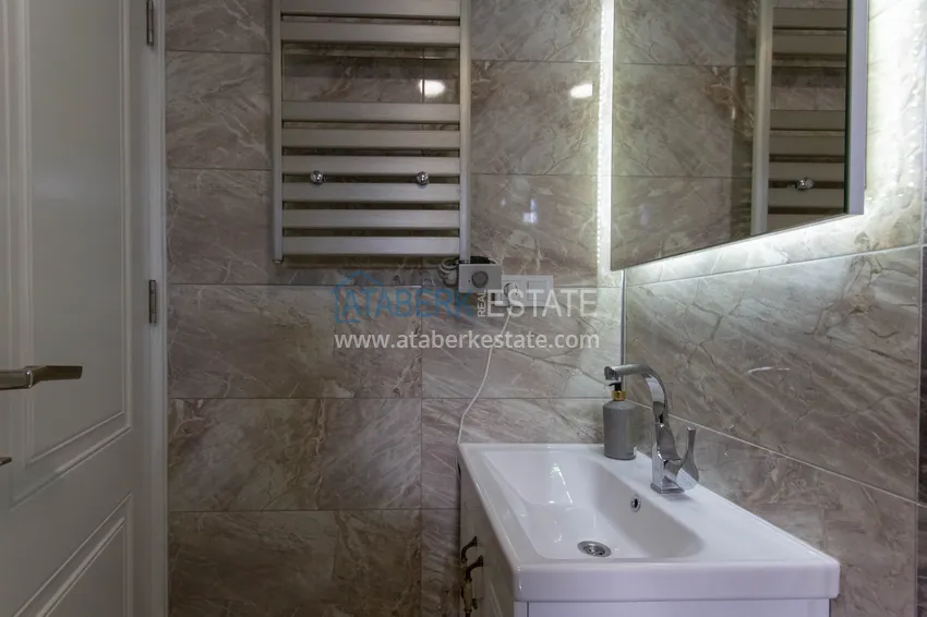 Purchase Duplex in Mahmutlar with furniture and sea and mountain views in a new complex 25 