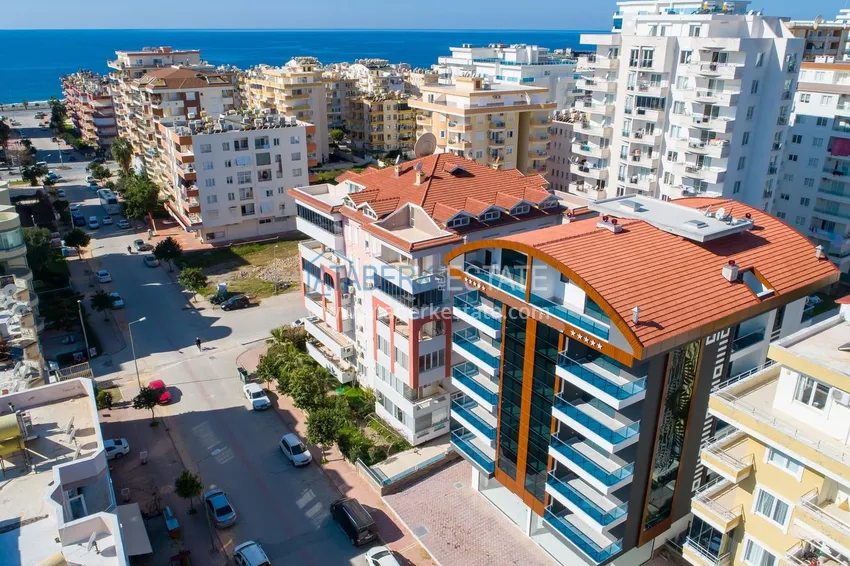 Duplex in Mahmutlar with furniture and sea and mountain views in a new complex 2 