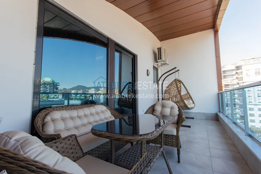 Purchase Duplex in Mahmutlar with furniture and sea and mountain views in a new complex 52 