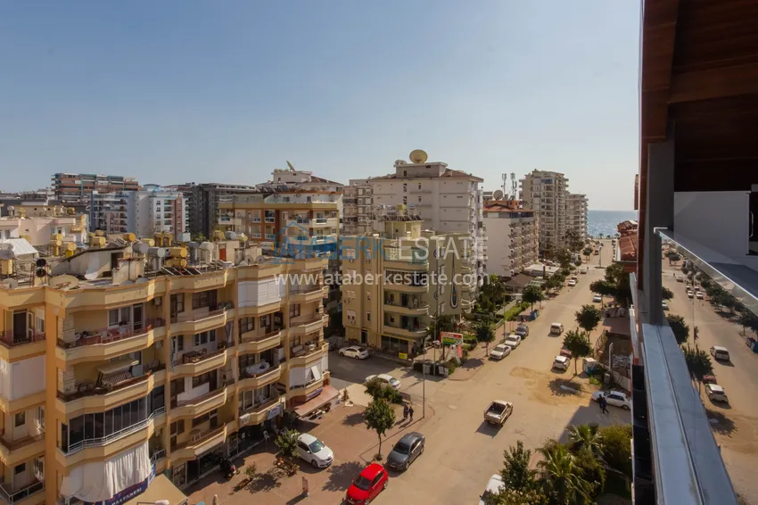 Purchase Duplex in Mahmutlar with furniture and sea and mountain views in a new complex 54 