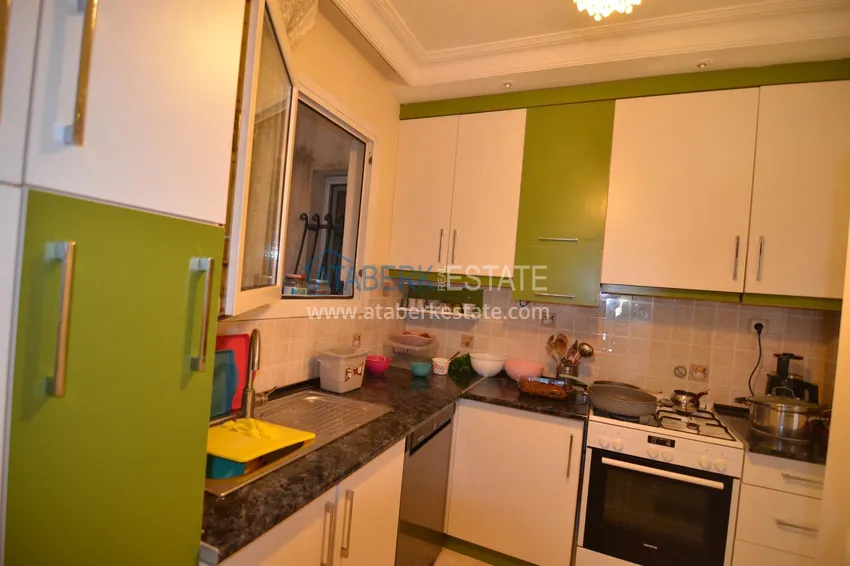 Purchase  Furnished apartment in the center of Alanya with 3 bedrooms and a separate kitchen 12 