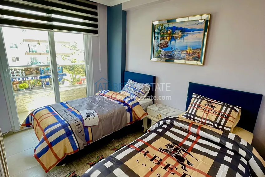 Purchase  Furnished apartment in the Kestel district with a glazed balcony and mountain views 15 