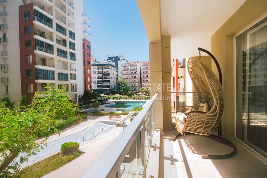 Purchase  Apartment in Mahmutlar with furniture and a separate kitchen in a comfortable complex 15 