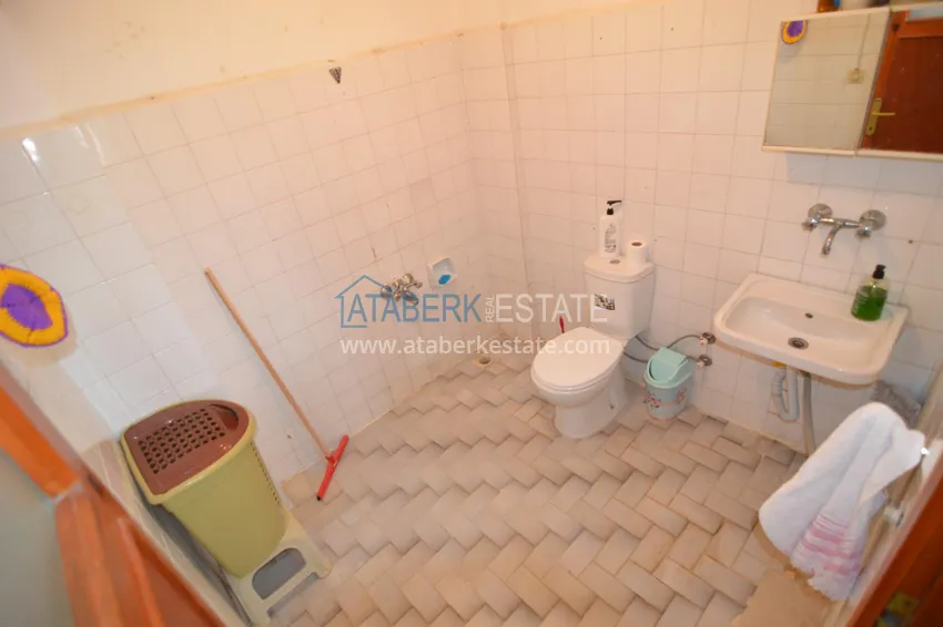 Purchase Three-room apartment in the center of Alanya with furniture and a separate kitchen 18 