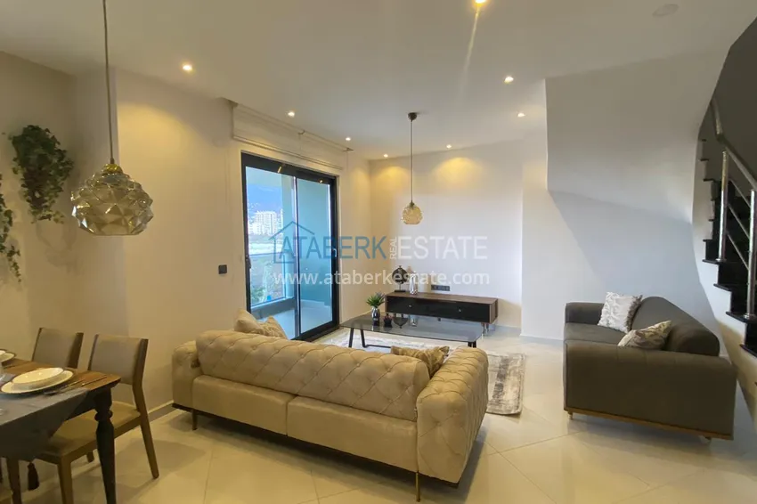 Purchase Furnished duplex penthouse in Mahmutlar with views of the mountains, the sea and the historic fortress 1 