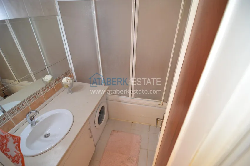 Purchase  Furnished apartment in the center of Alanya with 3 bedrooms and a separate kitchen 24 