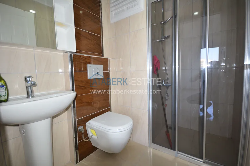 Purchase Apartment in Mahmutlar with mountain and sea views in a well-maintained complex 15