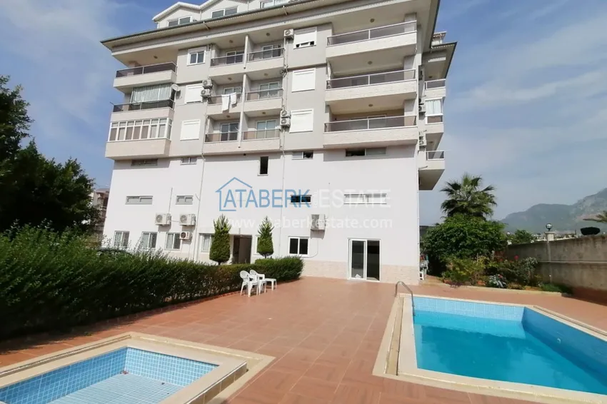 Furnished apartment in the Kestel district with a glazed balcony and mountain views 2 