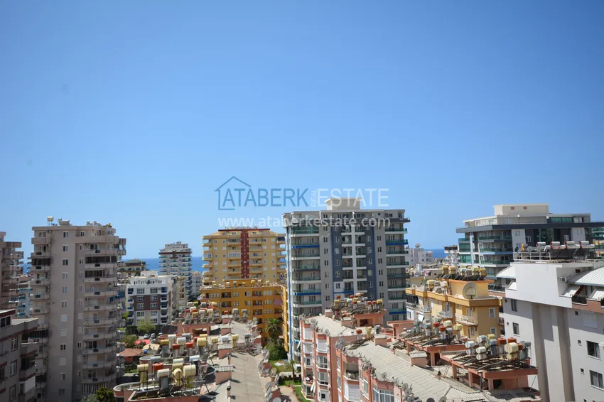 Purchase Apartment in Mahmutlar with mountain and sea views in a well-maintained complex 24