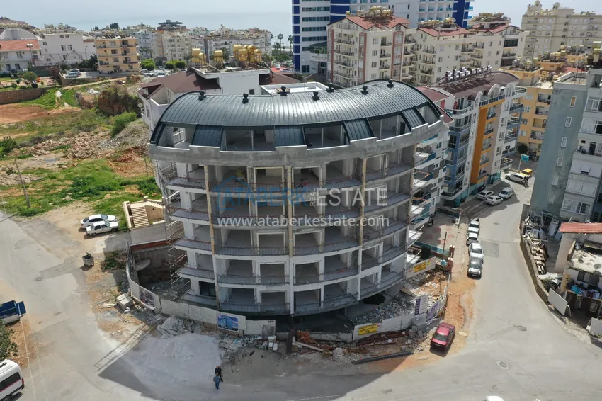 Apartment in Alanya - Tosmur area from an investor in a complex at the final stage of construction 3 