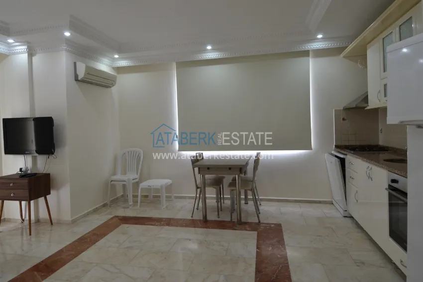 Purchase Apartment in the center of Alanya one-bedroom with furniture in a city residential building 4 