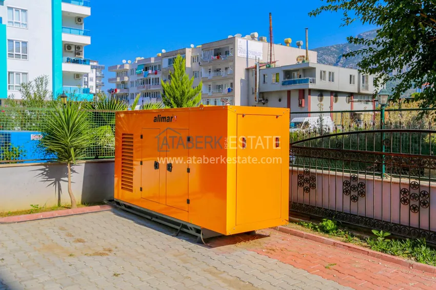 Furnished penthouse in Mahmutlar with sea view in a young complex 5 