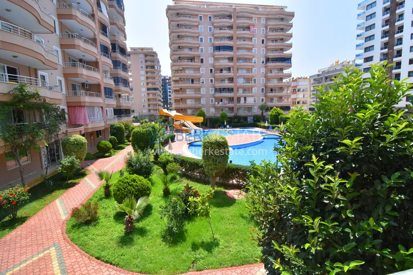 Apartment in Mahmutlar with author's renovation, glazed balconies and sea views 1 