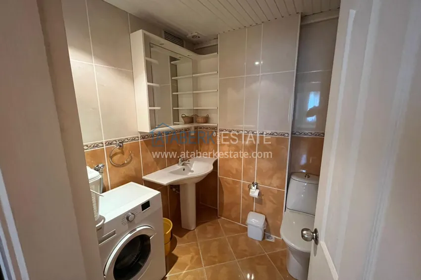 Purchase  Two-bedroom apartment for rent in the center of Alanya in a residential complex  16 