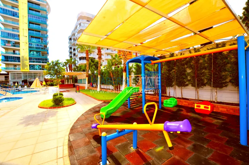 1+1 apartment for rent in Mahmutlar in a complex on the beachfront B26 9 