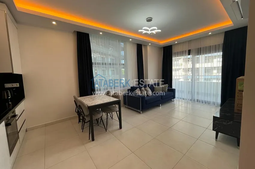 Purchase  1+1 apartment for rent for a summer vacation in Alanya Mahmutlar district  4 