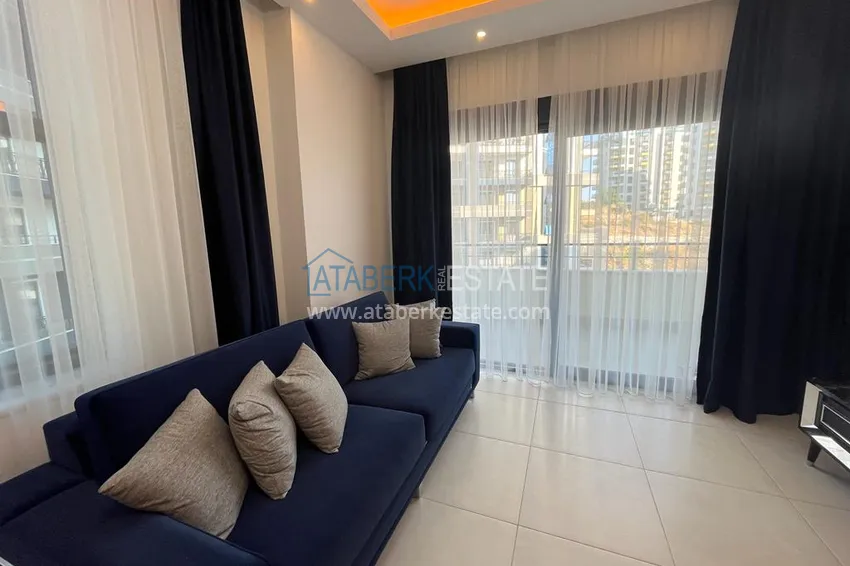 Purchase  1+1 apartment for rent for a summer vacation in Alanya Mahmutlar district  5 