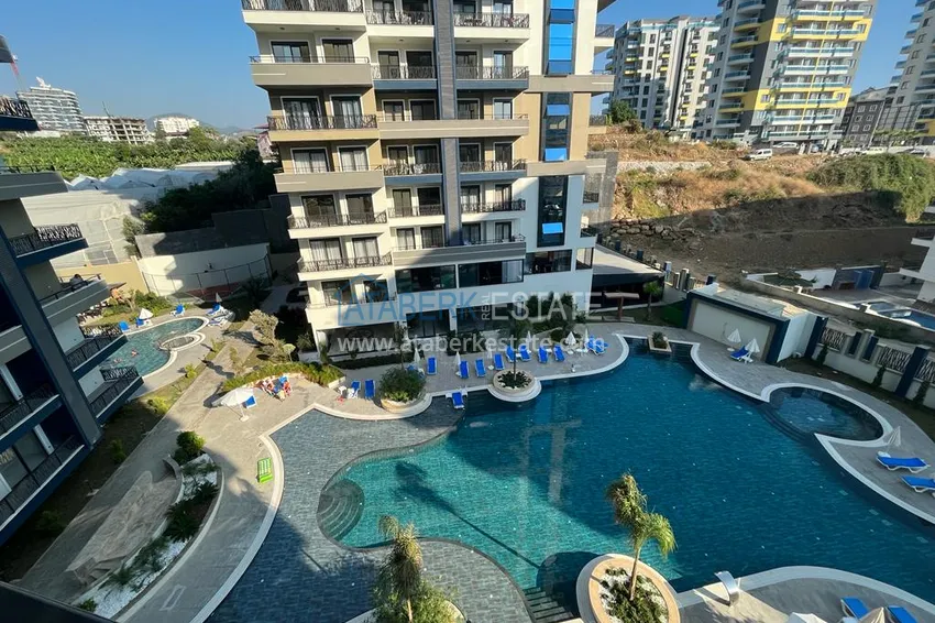 Purchase  1+1 apartment for rent for a summer vacation in Alanya Mahmutlar district  8 