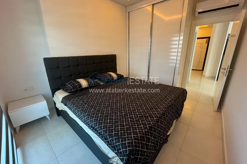 Purchase  1+1 apartment for rent for a summer vacation in Alanya Mahmutlar district  11 