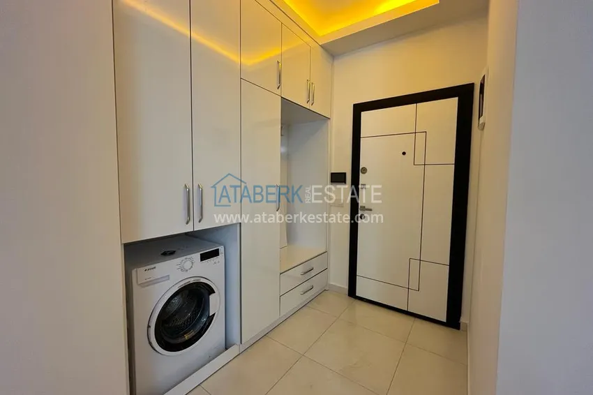 Purchase  1+1 apartment for rent for a summer vacation in Alanya Mahmutlar district  12 