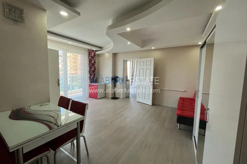 Purchase  1+1 apartment for rent in Mahmutlar in a complex on the beachfront B26 1 