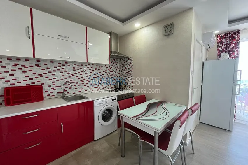 Purchase  1+1 apartment for rent in Mahmutlar in a complex on the beachfront B26 3 