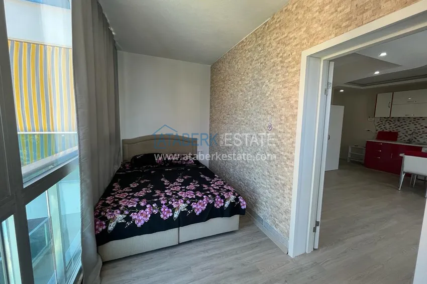 Purchase  1+1 apartment for rent in Mahmutlar in a complex on the beachfront B26 6 