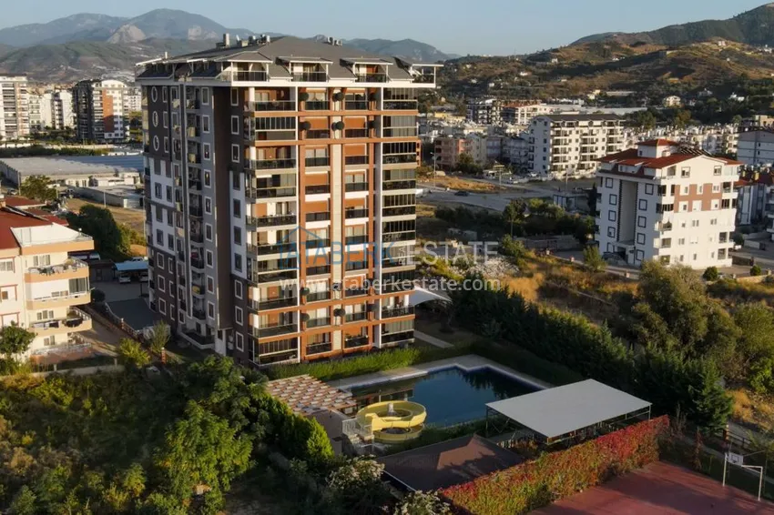 Furnished one-bedroom apartment with a glazed balcony and a panoramic open view of the sea and mountains - Gazipasa 1 