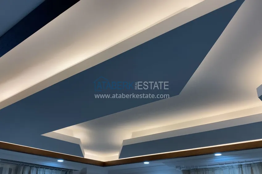 Purchase  Furnished one-bedroom apartment with a glazed balcony and a panoramic open view of the sea and mountains - Gazipasa 10 