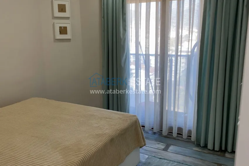 Purchase  Furnished one-bedroom apartment with a glazed balcony and a panoramic open view of the sea and mountains - Gazipasa 14 