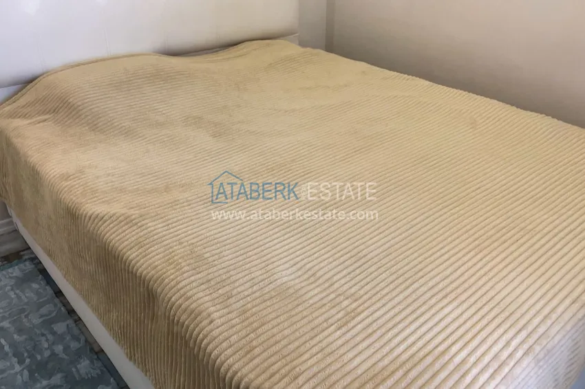 Purchase  Furnished one-bedroom apartment with a glazed balcony and a panoramic open view of the sea and mountains - Gazipasa 15 