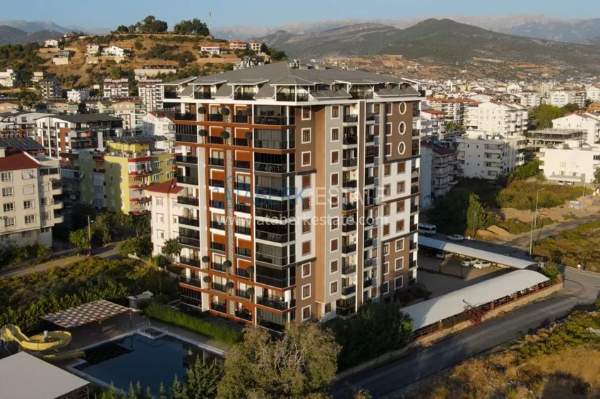 Furnished one-bedroom apartment with a glazed balcony and a panoramic open view of the sea and mountains - Gazipasa 2 