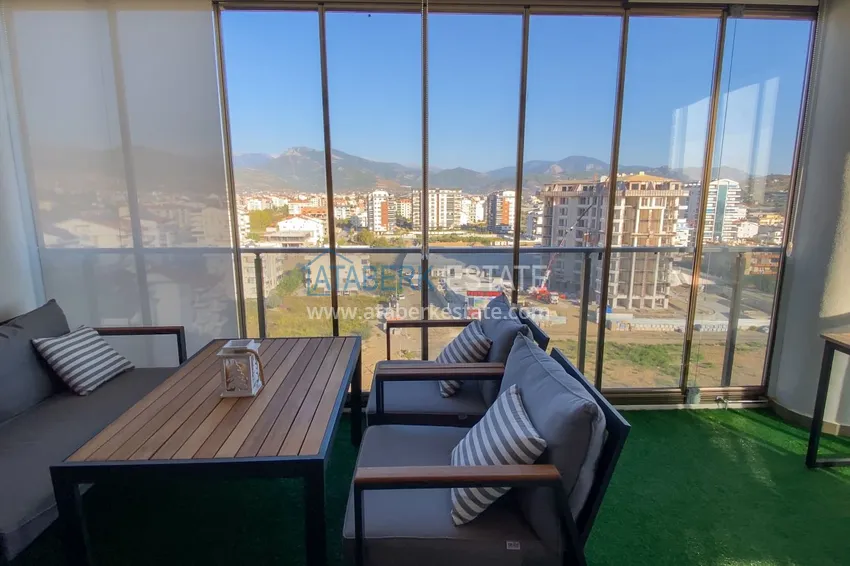 Purchase  Furnished one-bedroom apartment with a glazed balcony and a panoramic open view of the sea and mountains - Gazipasa 6 