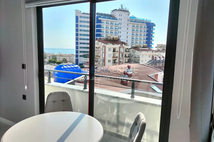 Purchase  1+1 penthouse with sea and mountain views in Alanya Tosmur B21 district 11 