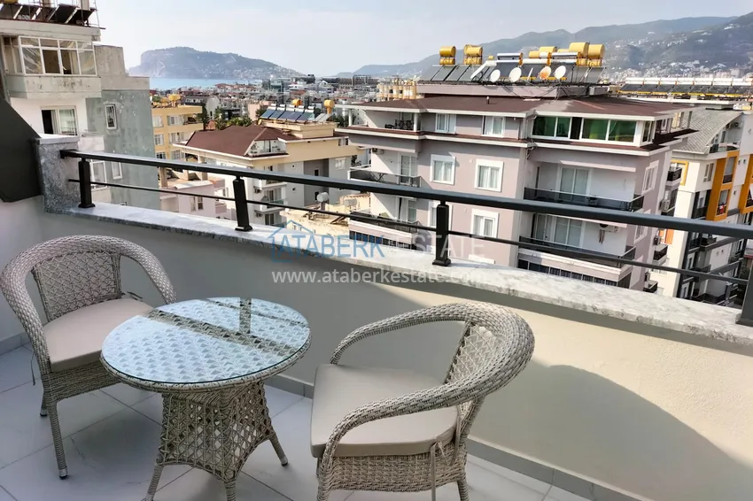 Purchase  1+1 penthouse with sea and mountain views in Alanya Tosmur B21 district 12 