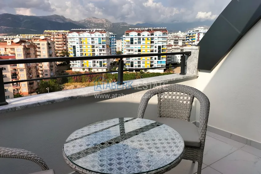 Purchase  1+1 penthouse with sea and mountain views in Alanya Tosmur B21 district 13 