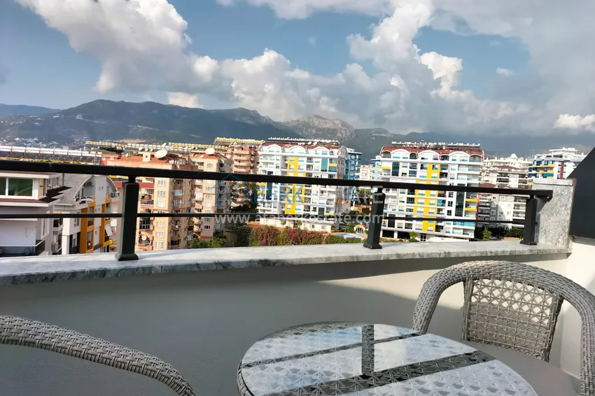 Purchase  1+1 penthouse with sea and mountain views in Alanya Tosmur B21 district 14 