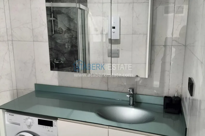 Purchase  1+1 penthouse with sea and mountain views in Alanya Tosmur B21 district 19 