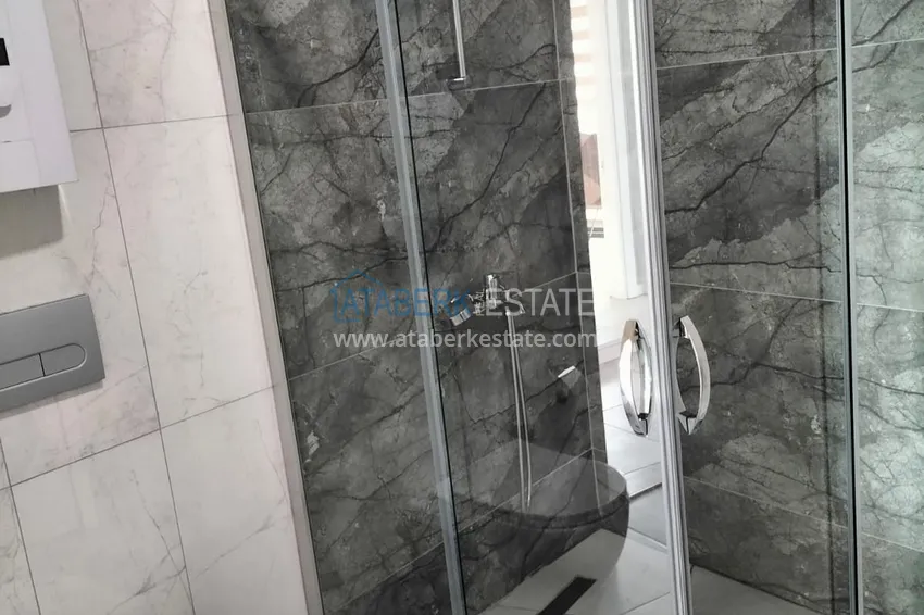 Purchase  1+1 penthouse with sea and mountain views in Alanya Tosmur B21 district 21 