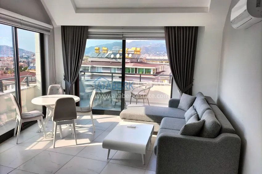 Purchase  1+1 penthouse with sea and mountain views in Alanya Tosmur B21 district 3 