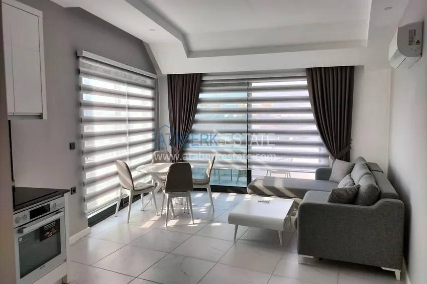 Purchase  1+1 penthouse with sea and mountain views in Alanya Tosmur B21 district 4 