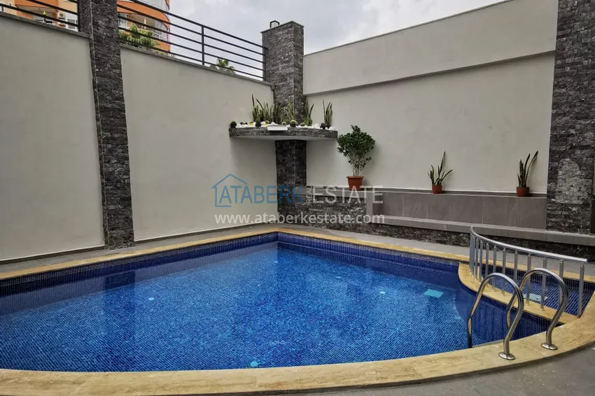 1+1 penthouse with sea and mountain views in Alanya Tosmur B21 district 4 