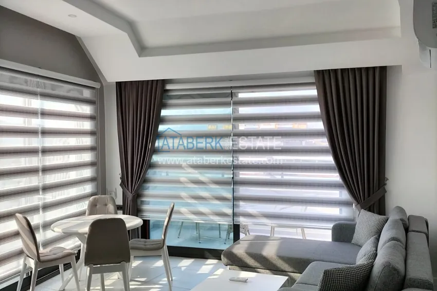Purchase  1+1 penthouse with sea and mountain views in Alanya Tosmur B21 district 5 