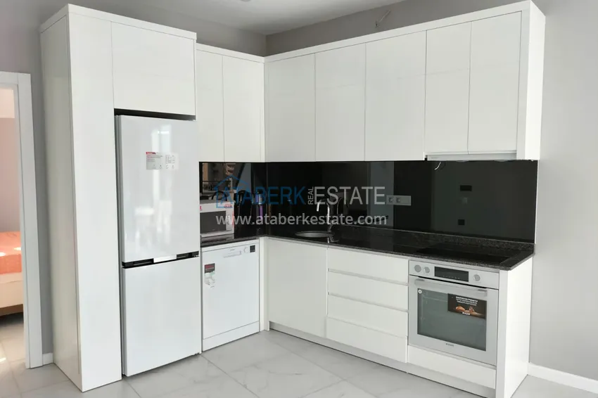 Purchase  1+1 penthouse with sea and mountain views in Alanya Tosmur B21 district 7 