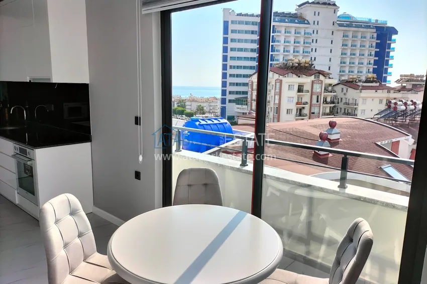 Purchase  1+1 penthouse with sea and mountain views in Alanya Tosmur B21 district 10 