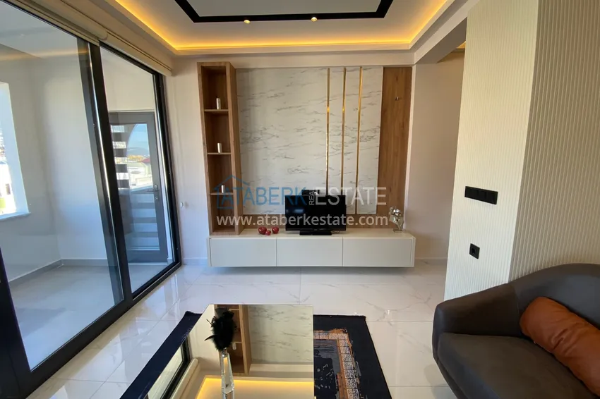 Purchase  Three-room apartment in the center of Alanya with an author's interior and an open view of the mountains 11 